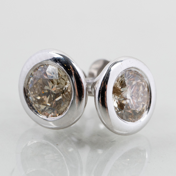 ENSTENSÖRHÄNGEN, 1 par, 14k vitguld, briljantslipade diamanter tot ca 1.00 ct, tot vikt ca 2 g