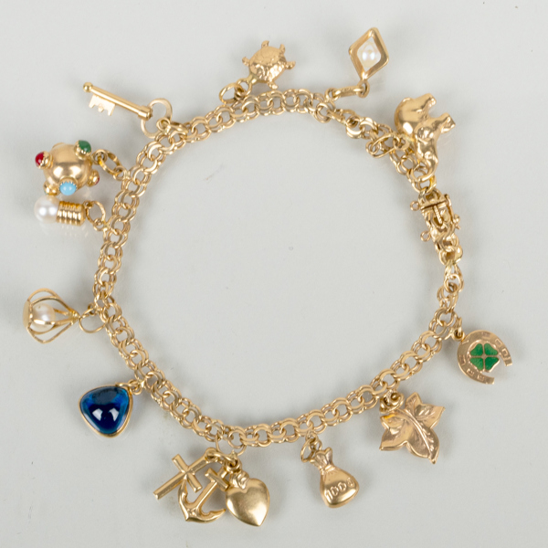 ARMBAND, 18k guld, Boliden 1947, med berlocker, tot vikt ca 17,5 g