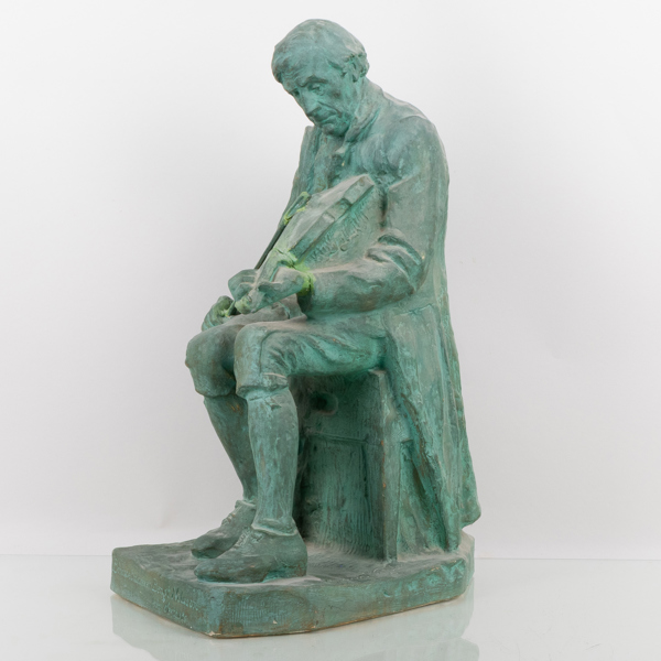 OIDENTIFIERAD KONSTNÄR, skulptur, patinerat gips, signerad och daterad 1911