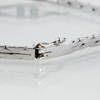 ARMBAND 18k vitguld, med smaragder och diamanter