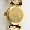 DAMARMBANDSUR, 18k guld, Onsa, tot vikt ca 25,6 g 