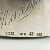 SKALLROR, 2 st, silver, 1900-tal, tot vikt inkl plast ring ca 30 g