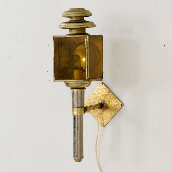 VAGNSLYKTA, mässing, 1900-talets första hälft