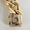ARMBAND, 18k guld, med plakett, vikt ca 36,4 g