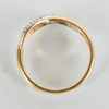 RING, 18 tvåfärgat guld, med 9 briljantslipade diamanter tot ca 0.29 ct, tot vikt ca 4 g 
