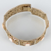 ARMBAND, förgyllt silver, med skurna snäckskalskaméer, 1900-talets första hälft 