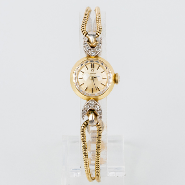 DAMARMBANDSUR, Omega, 18k guld, med briljantslipade diamanter, 1900-talets mitt