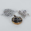 BROSCHER, 3 st, metall och silver, 1900-tal 