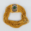 ARMBAND, 18k guld med smaragd och gammalslipade diamanter, 1900-tal