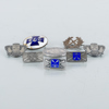 JUBILEUMSMYNT SAMT BROSCHER, 6 st, silver och emalj, 1900-tal