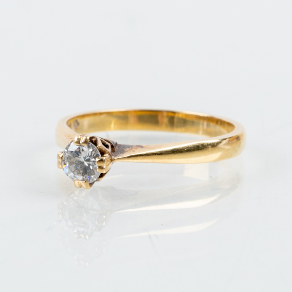 ENSTENSRING, 18k guld, svenska stämplar GD & Co 1978, med briljantslipad diamant ca 0.22 ct