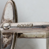 BROSCHER, 2 st SAMT MANSCHETTKNAPPAR, 1 par, silver, bla K&EC och GAB, 1900-tal
