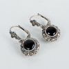COLLIER, BROSCH OCH 1 PAR ÖRHÄNGEN, silver, bla med paste, markasiter, onyx och granater, 1900-talets första hälft 