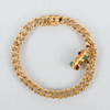ARMBAND, 18k guld, med berlock, 1900-talets andra hälft 