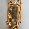 ARMBAND, 18k guld, med berlock, 1900-talets andra hälft 
