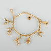 ARMBAND, 14k/18k guld, med berlocker