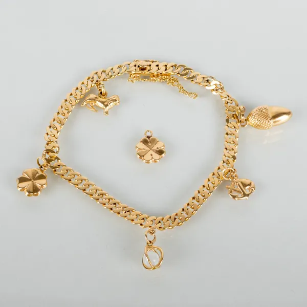 ARMBAND, 18k guld, med berlocker, Juvelfabriken AB, Stockholm 1940