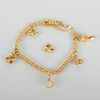 ARMBAND, 18k guld, med berlocker, Juvelfabriken AB, Stockholm 1940