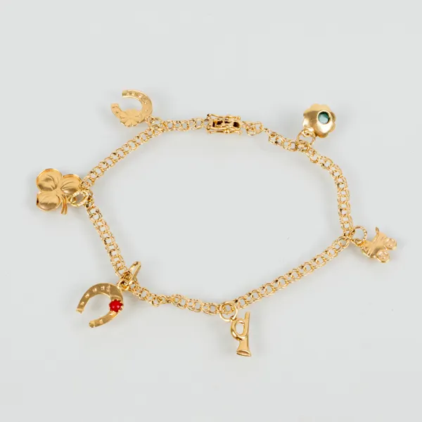 ARMBAND MED BERLOCKER, 18k guld