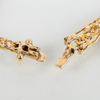 ARMBAND MED BERLOCKER, 18k guld