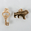 HÄNGEN, 2 st, 18k guld, lejon och nyckel, 1900-talets andra hälft