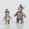 HÄNGEN, 2 st, silver, i form av björnar, 1900-/2000-tal