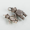 HÄNGEN, 2 st, silver, i form av björnar, 1900-/2000-tal