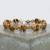 ARMBAND, gulmetall, Sara, Kalevala, Finland, 1960-/70-tal