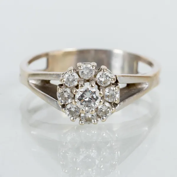 CARMOSÉRING, 14k vitguld med 9 briljantslipade diamanter, sannolikt 1900-talets andra hälft 