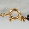 ARMBAND, 18k guld, med svarta kulor, sannolikt 1900-talets andra hälft