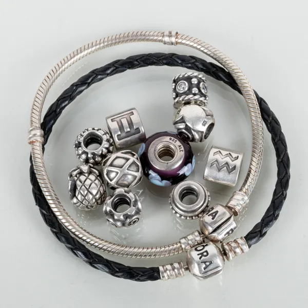 ARMBAND, 2 st, Pandora, sterlingsilver, med berlocker, 2000-tal