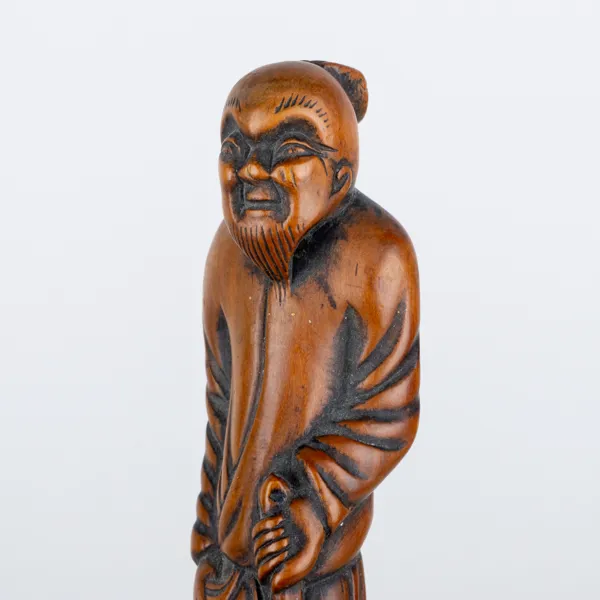 BÄLTESSPÄNNE/NETSUKE, skuret trä, Japan, Edo, sannolikt 1700-/1800-tal